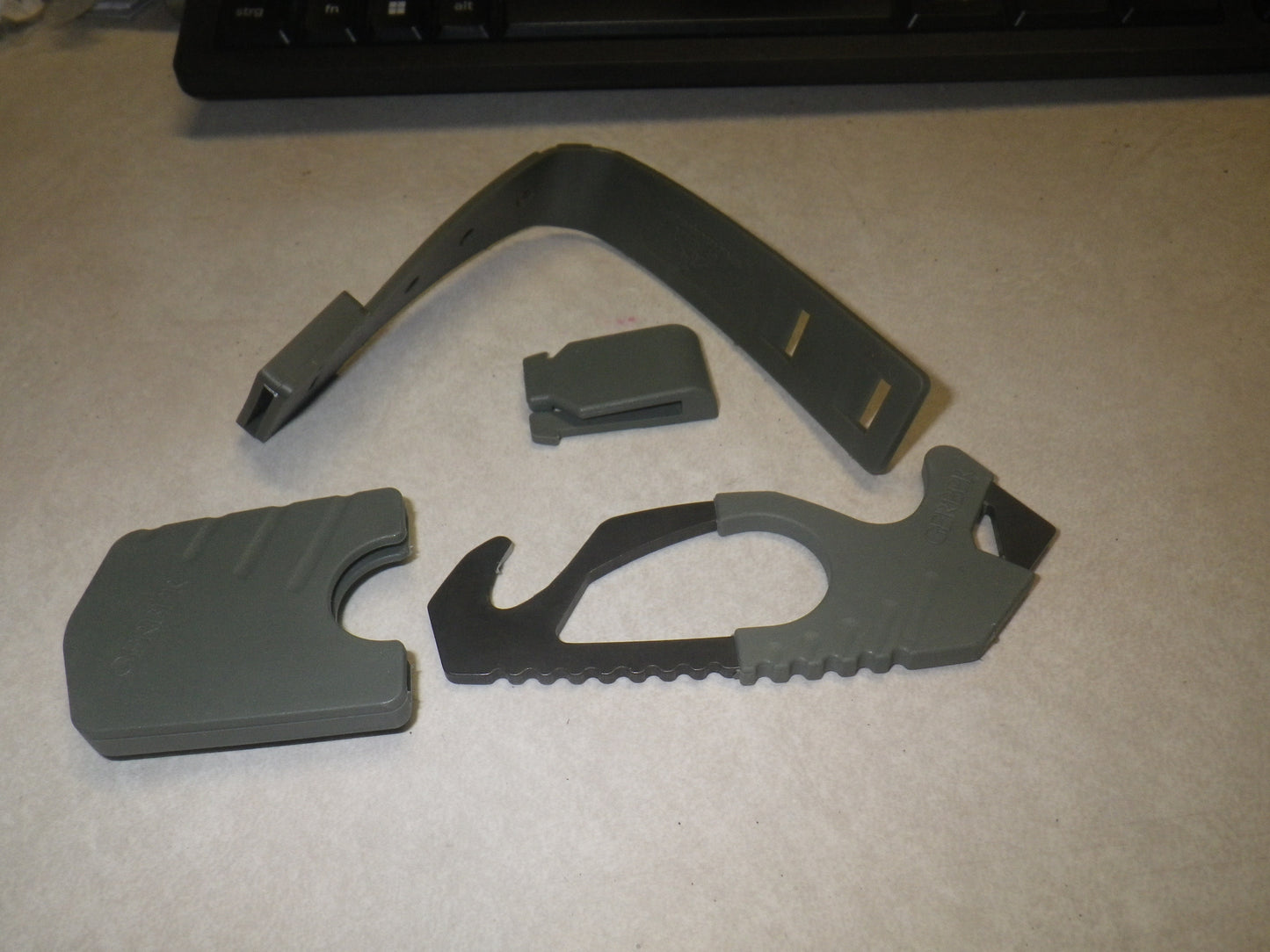 Gurtschneider GERBER Molle Strap Cutter, Foiliage Green US ARMY